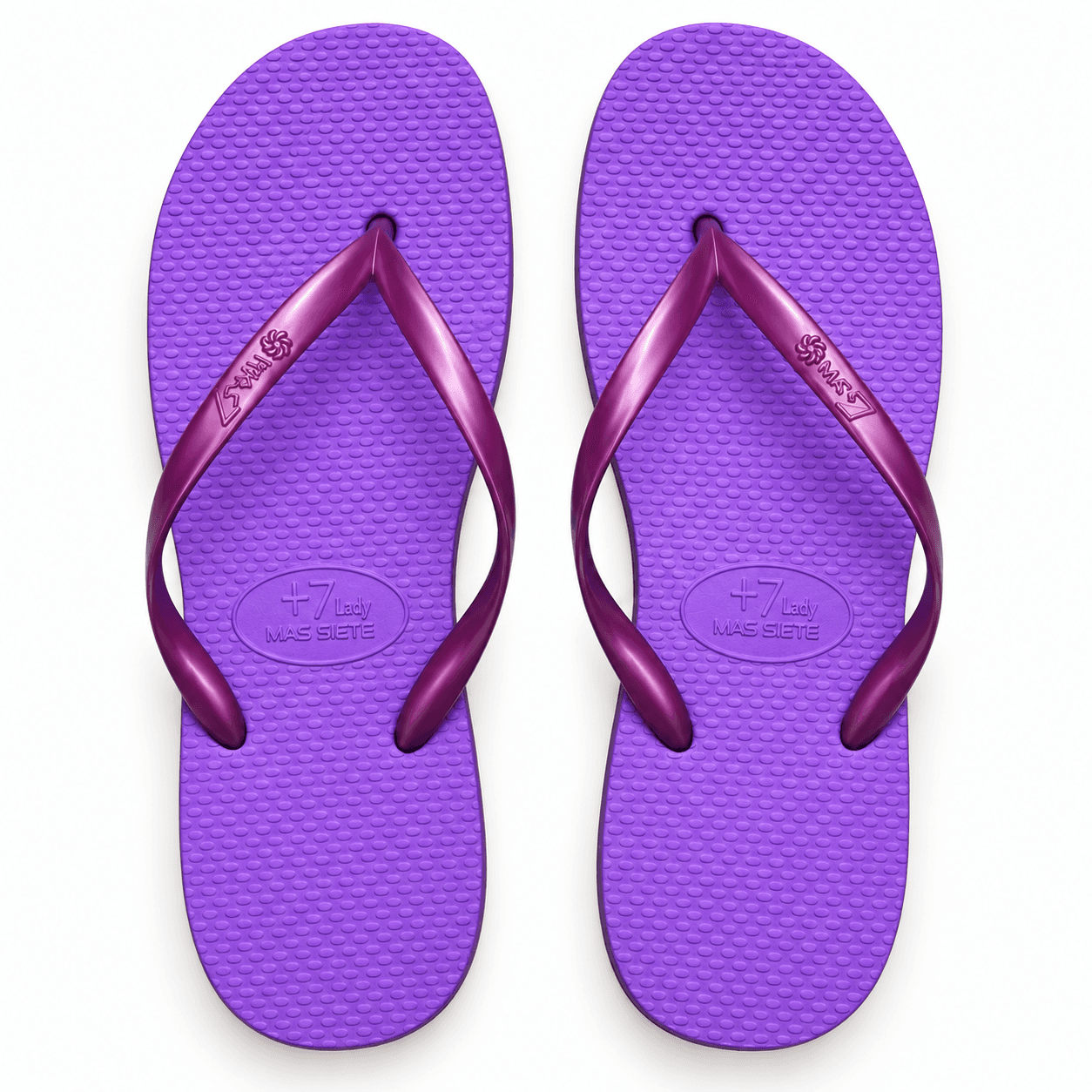 Par de ojotas de mujer color Violeta, visto desde arriba sobre fondo blanco.